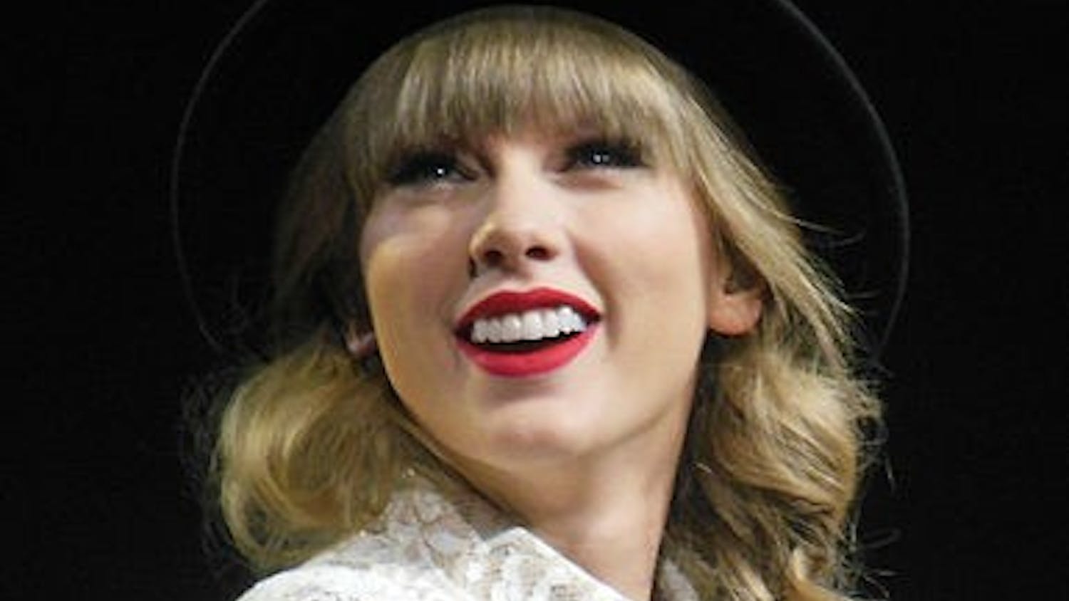 385px-Taylor_Swift_Red_Tour_2,_2013.jpg