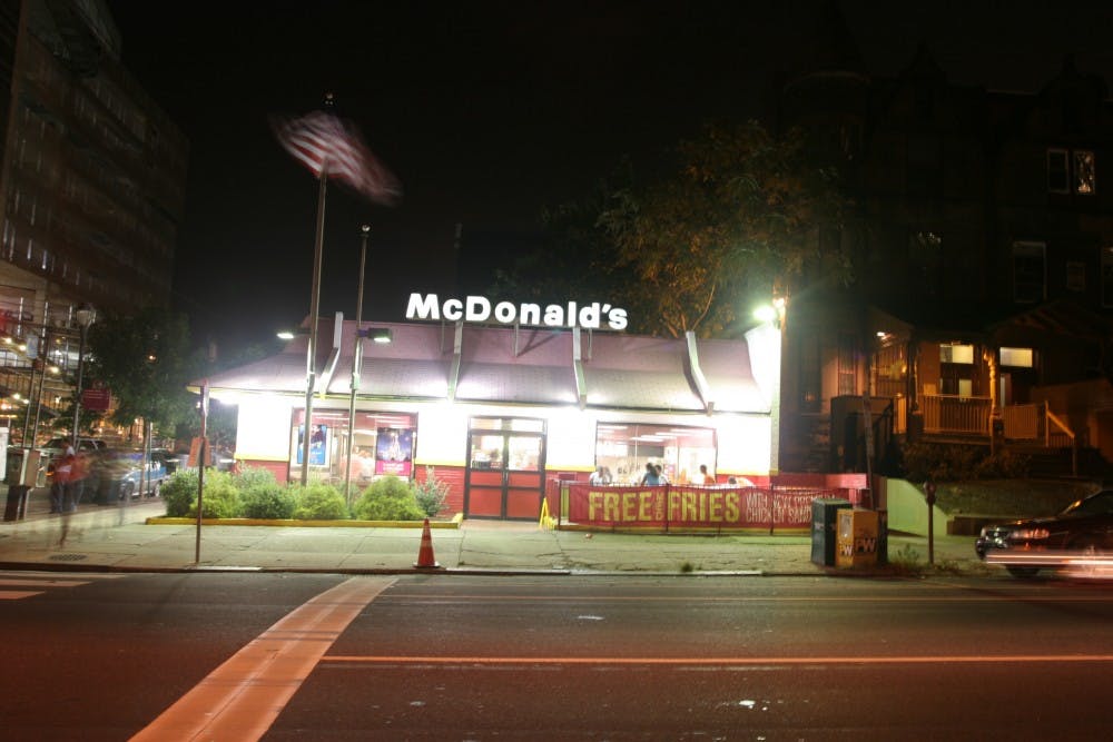 Coach lake musters quaker support during the football gameFootball v. DuquesneMcDonald's at 40th and Walnut