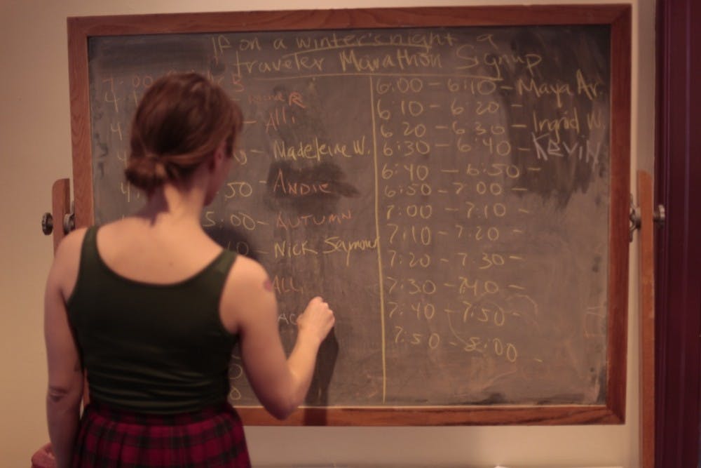 Students and adults sign up for last year's Marathon Reading of If On A Winter's Night A Traveller.