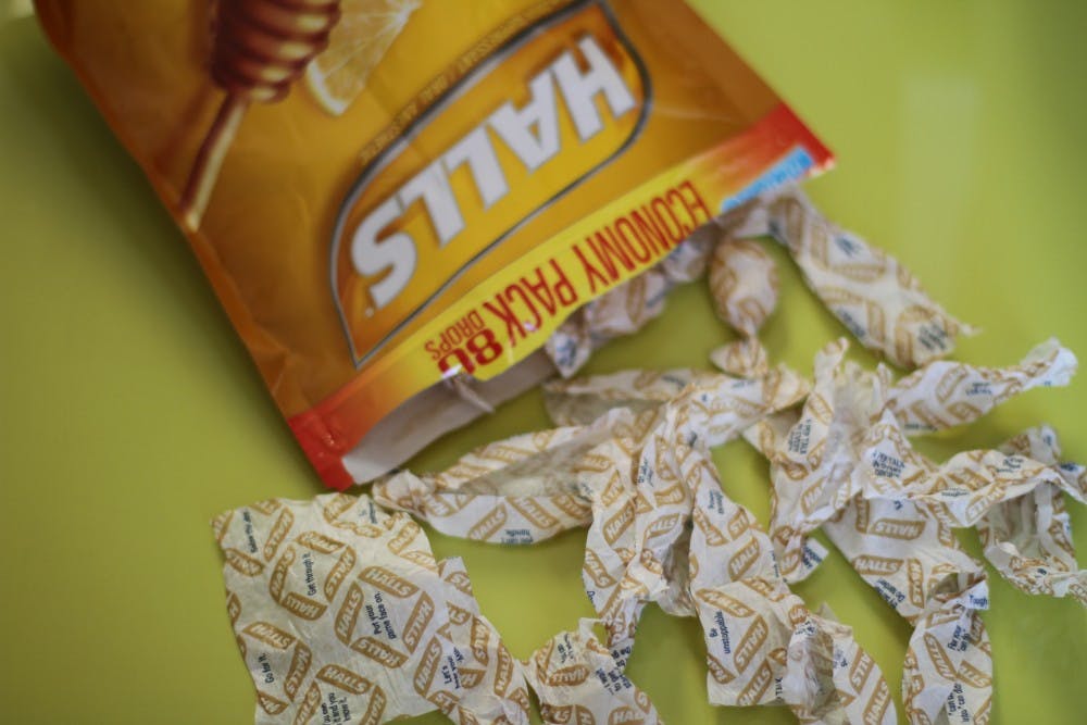 Slowly Consuming An Entire Package Of Halls Cough Drops