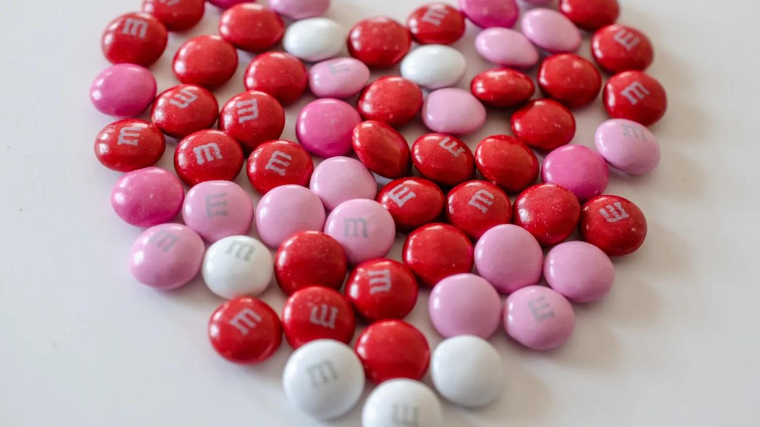 The other side of these M&Ms says "PLEASE TAKE MY CALLS."