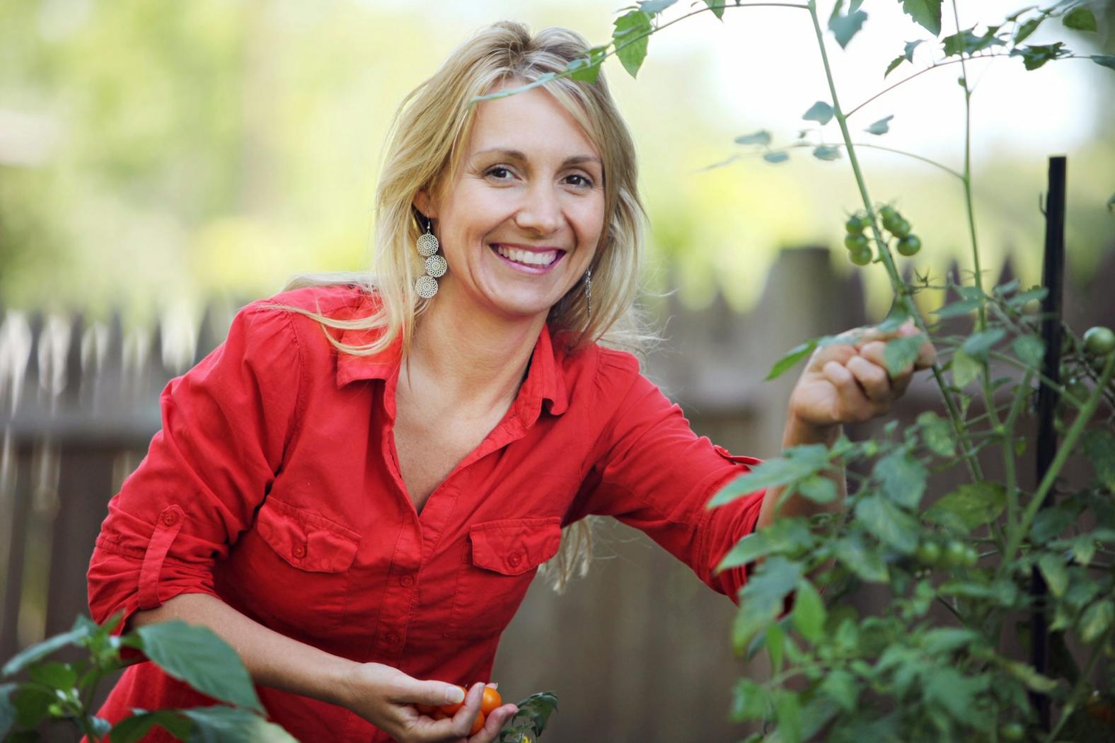 aimee picking tomato.jpg