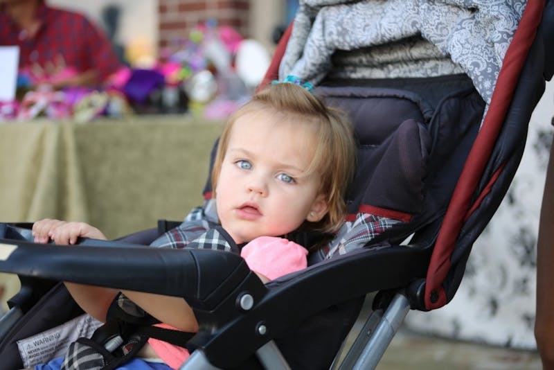 Brilliant! Student Avoids Talking to People on Locust by Being Pushed to Class in a Stroller  