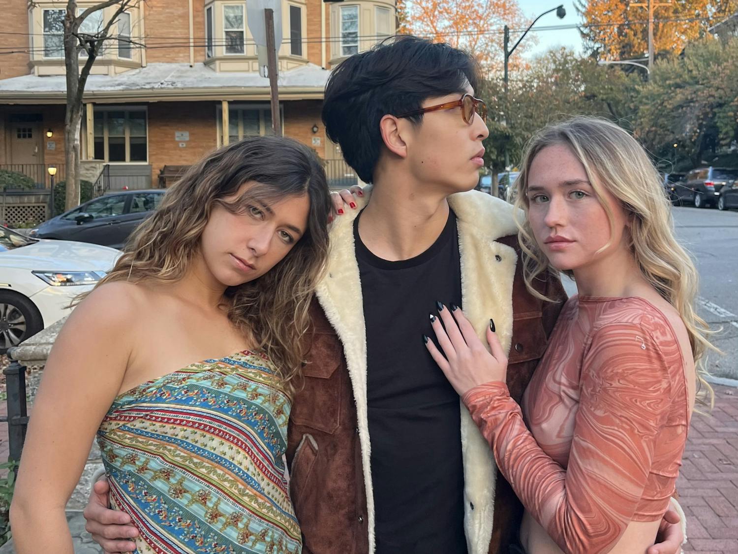 Strapping Asian guy and two beautiful blonde sidekicks