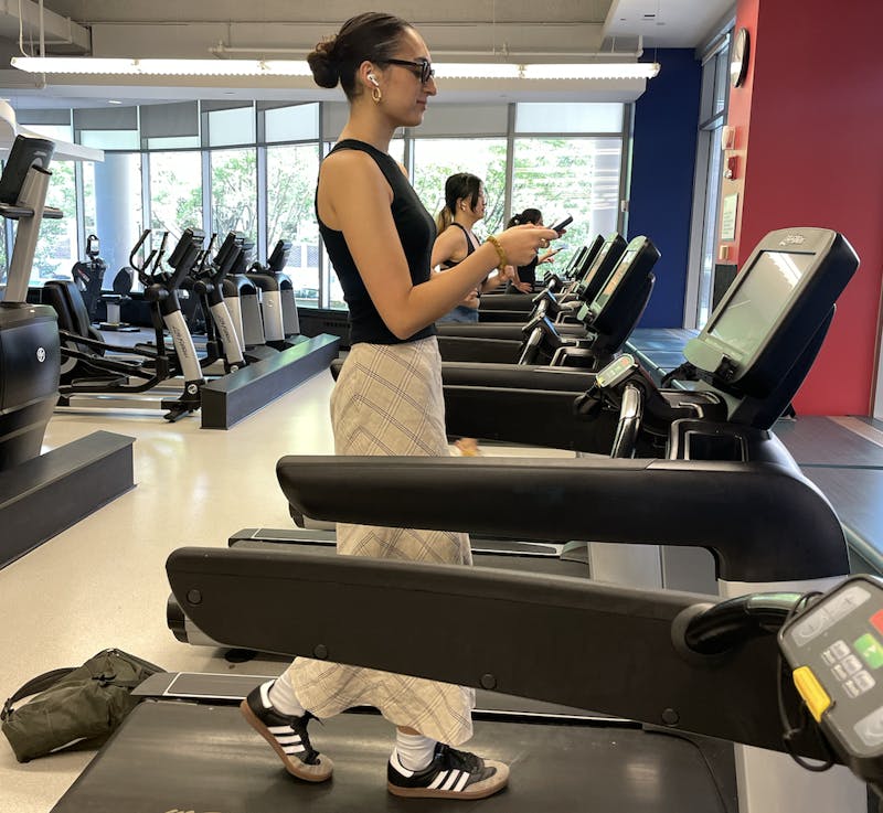 Slay Yes, Mama! Girl with Slicked Back Bun Goes to Gym to Walk on Treadmill for 10 Minutes
