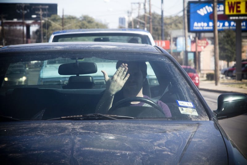 Angry Driver in Center City Frustrated by Ineffectiveness of Honking