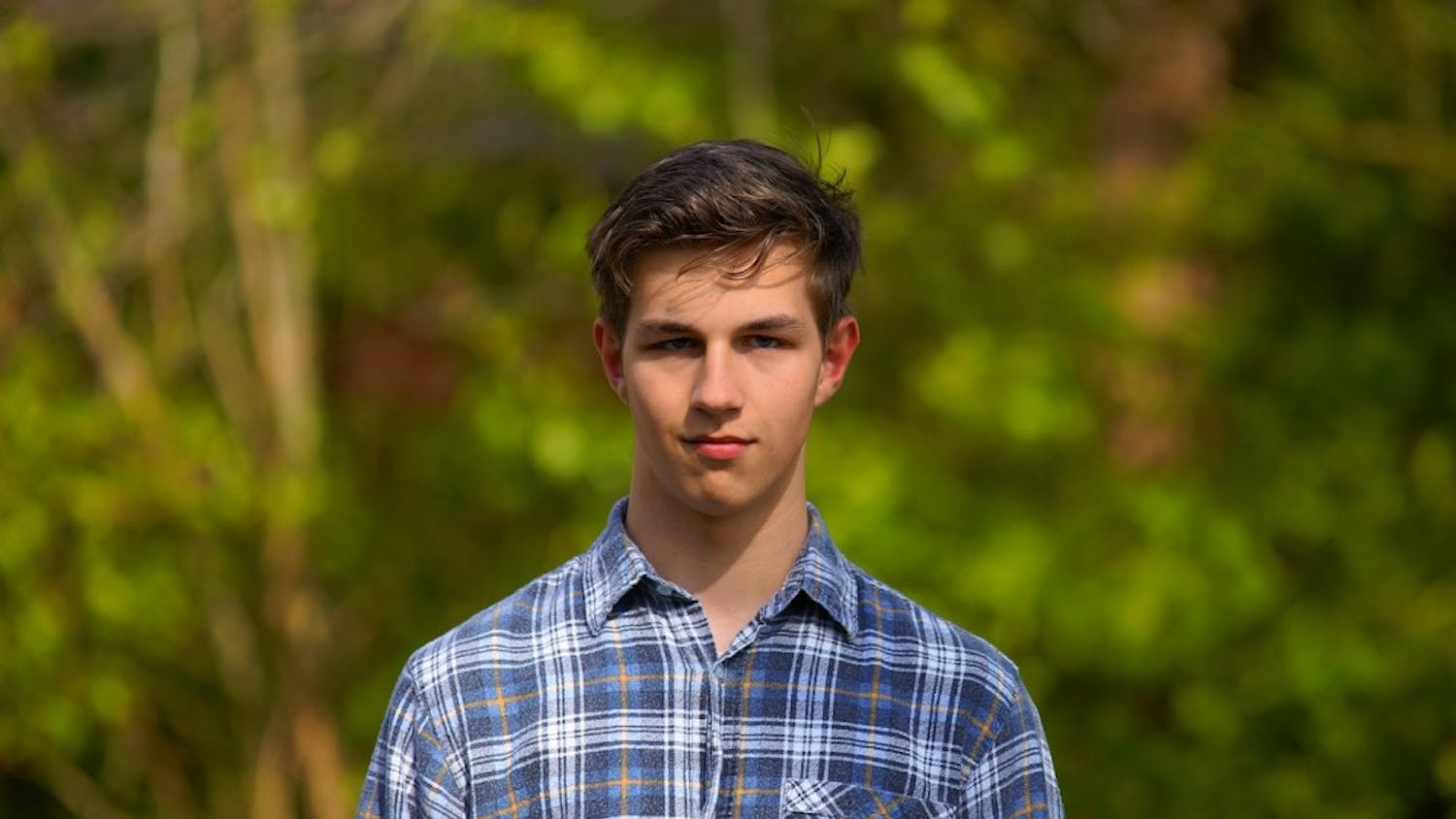 young man flannel stock photo