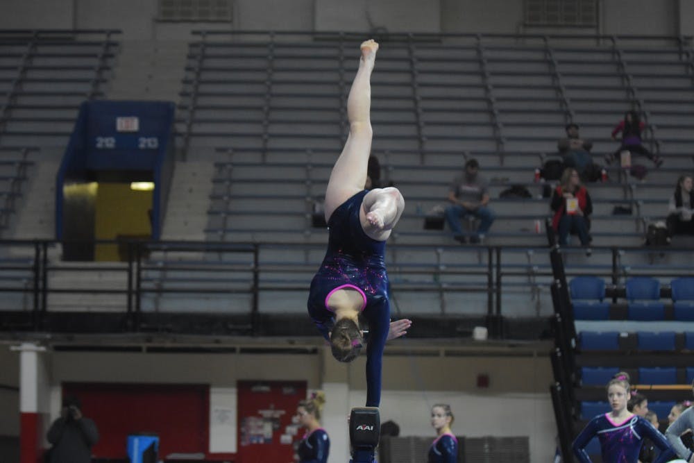 In her breakout season this year, sophomore captain Caroline Moore has been one of the most consistent performers for Penn gymnastics.