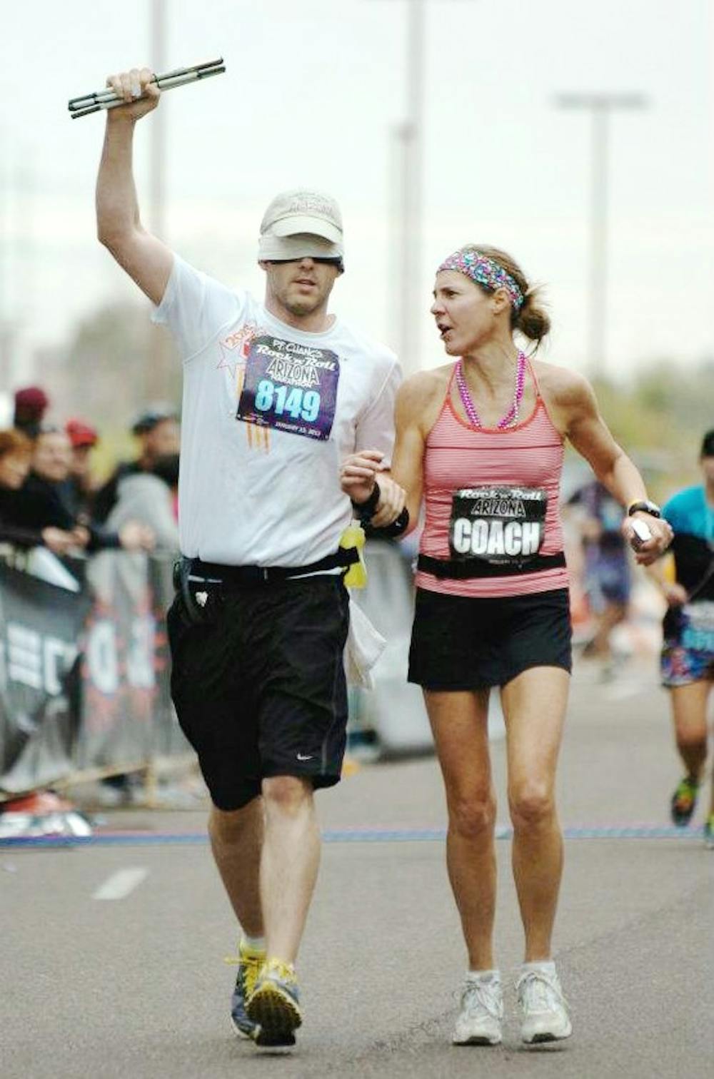 	E.J. Scott finishes a marathon in Phoenix this past January. Scott is aiming to run 12 marathons in 12 months to raise funds for Choroideremia.