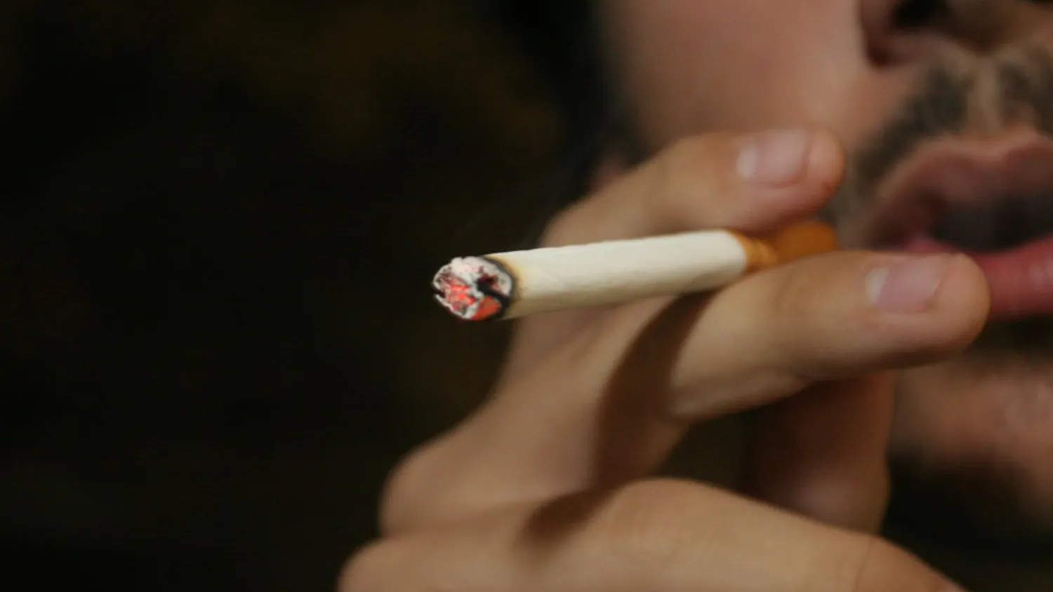 alex and lea smoke cigarettes on the roof
smoking ban photo illustration