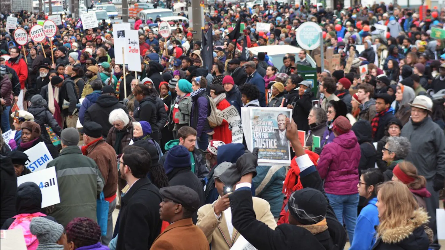 Thousands of people, including Penn students, rallied in front of the Philadelphia School District building before the start of the Reclaim MLK march on Monday.