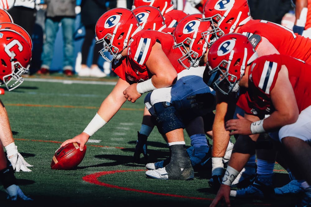 football-vs-cornell-offensive-line-1