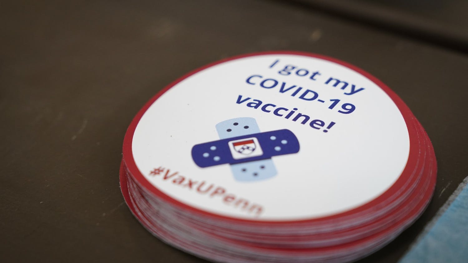 04-14-21 Penn Vaccination Site Photo Illustration I Got COVID-19 Vaccine Sticker #VaxUPenn (Chase Sutton) .jpg