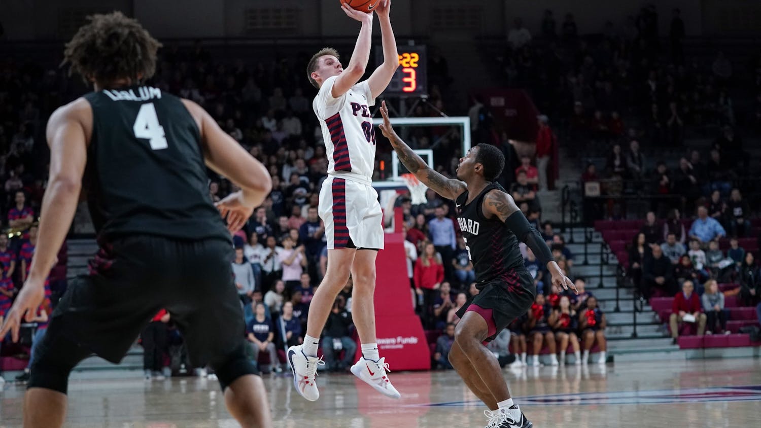 MBB Harvard Halftime Ryan Betley Three Pointer.jpg