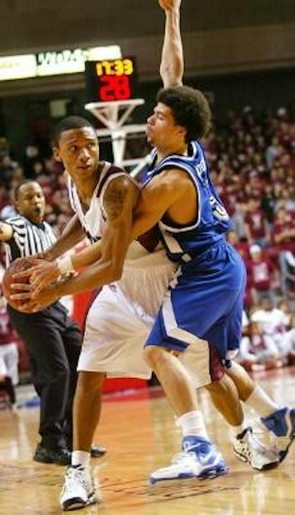 Owls fall by two in home opener