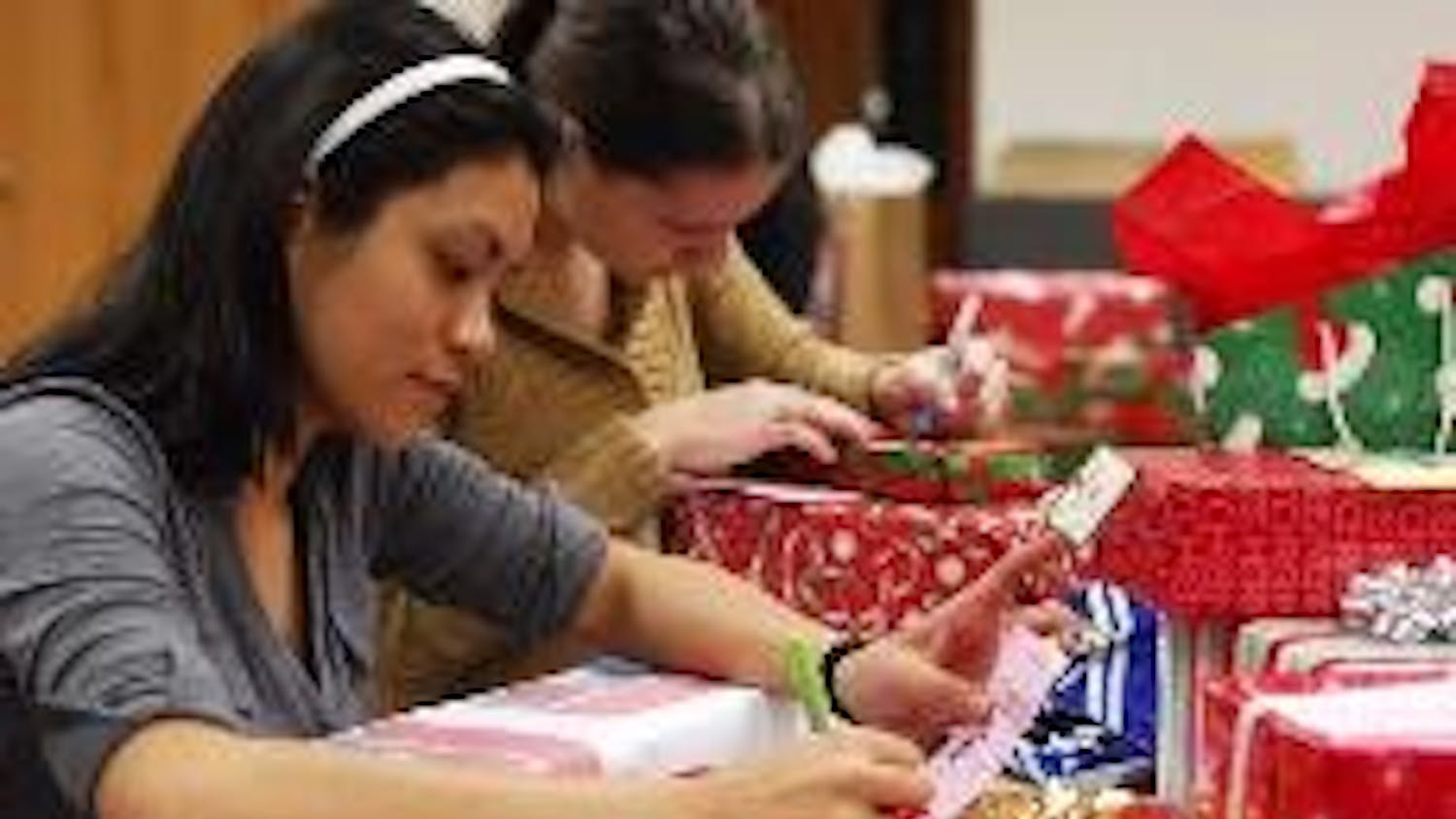 Students act as Santa's helpers