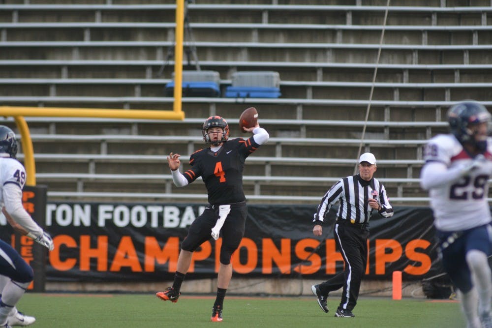 Princeton senior quarterback Quinn Epperly throws a big pass as the Tigers jumped ahead of Penn in the first half.