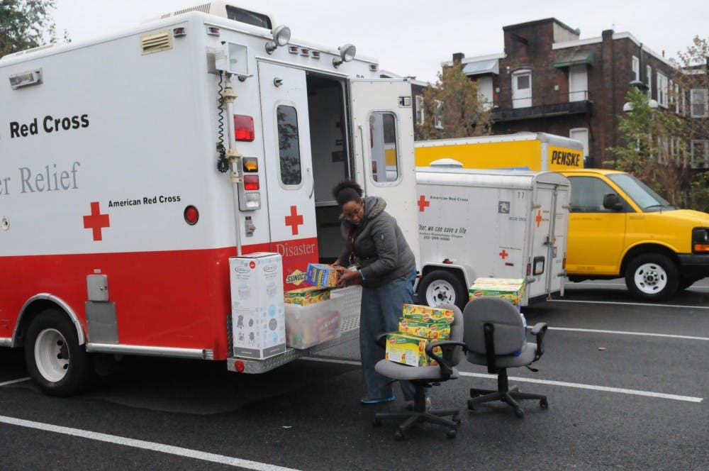 West Philadelphia High School opened its gym to residents seeking shelter from Hurricane Sandy.