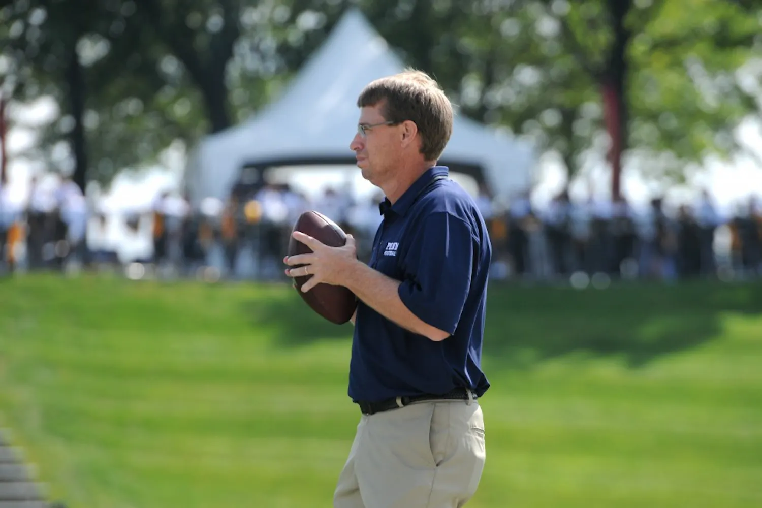 Penn football defensive coordinator Bob Benson, in his second year in University City, is in the midst of his first season getting to share a role in Penn Athletics with his wife and assistant cross country coach Juli.
