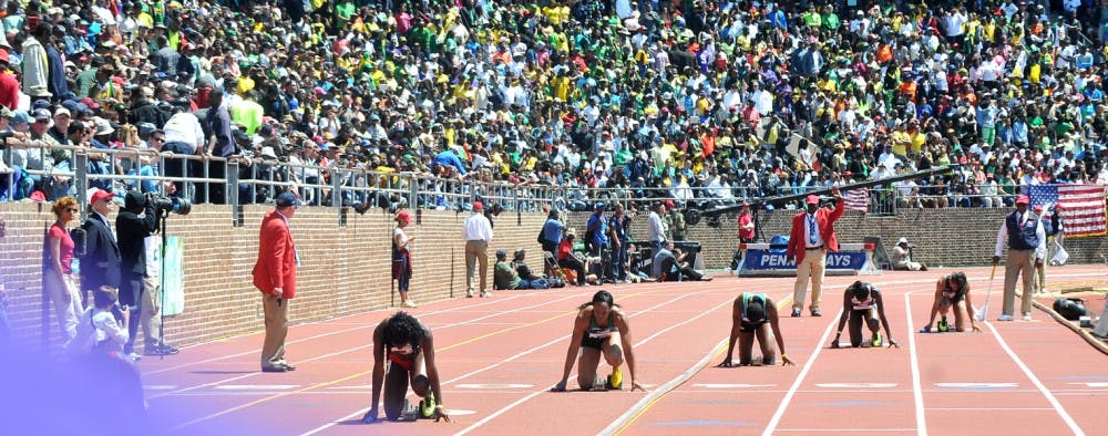 Penn Relays 2013, held at Franklin FIeld, featuring multiple Olympian athletes in the USA vs the World event