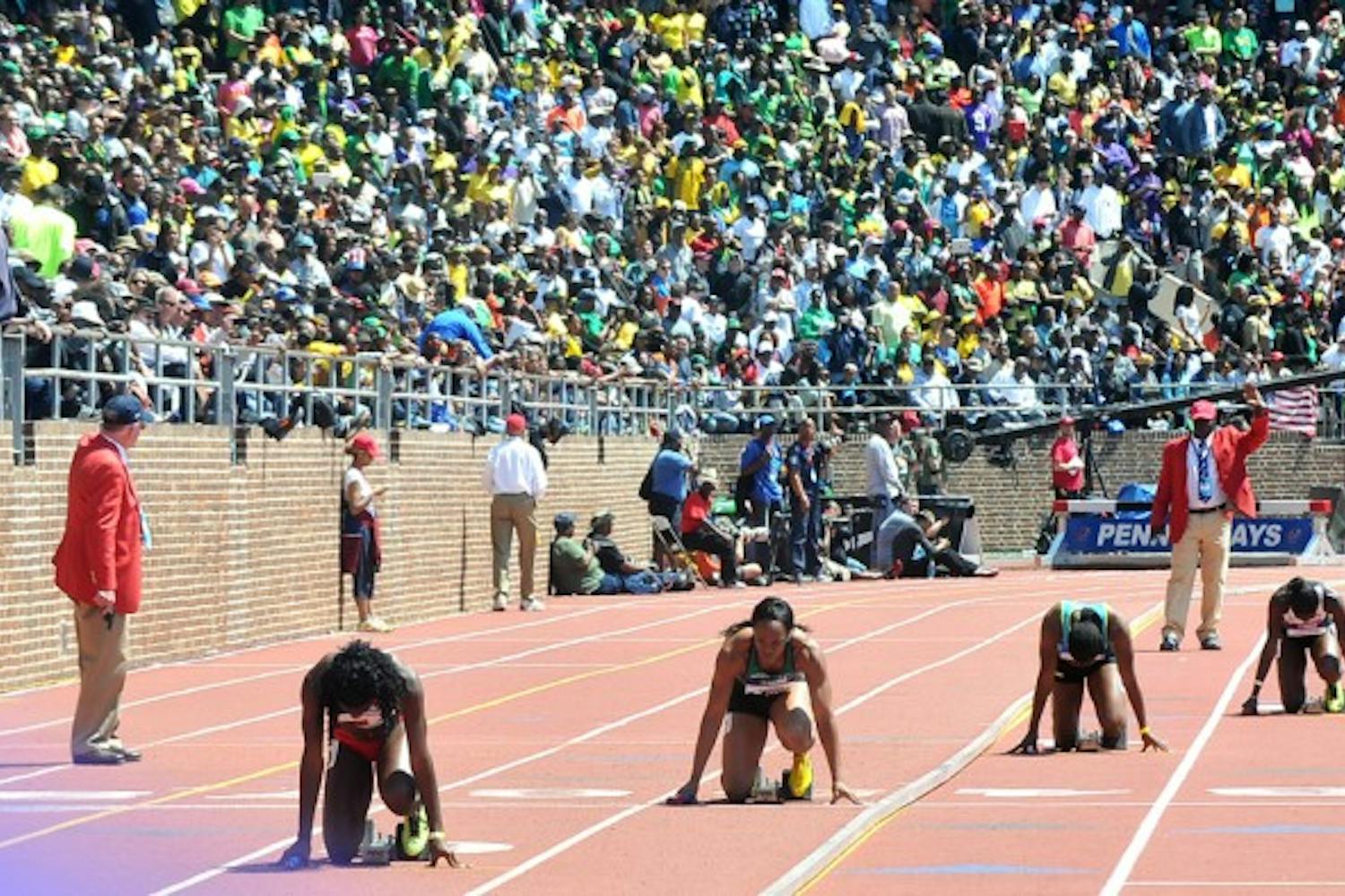Penn Relays 2013, held at Franklin FIeld, featuring multiple Olympian athletes in the USA vs the World event