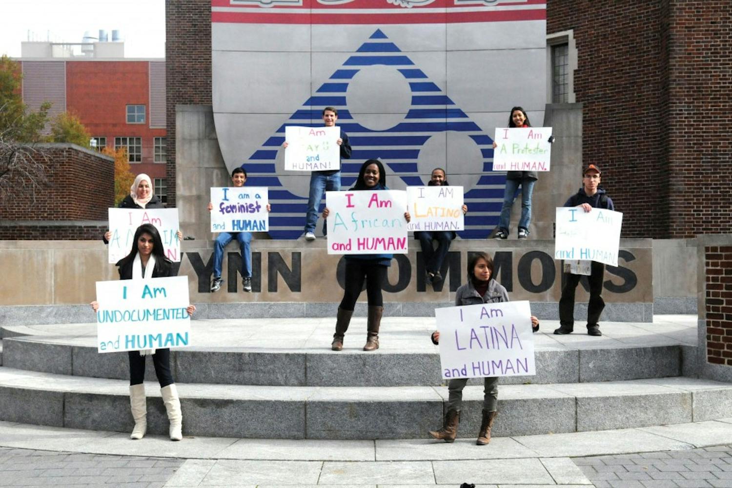 Penn for Immigrant Rights and Penn Political Coalition's I Am A Human Demonstration
Gionni Ponce '15 (hat)
Tania Chairez '14 (white boots)
Angel Contrera '13 (black jacket blue hood)
Abraham Moller '15 (A's hat)
Iris Mayoral '15 (I am Latina sign)
Afnaan Moharram '14 (tan headscarf)
Ibi Etomi '14 (turquoise)
Ricky Swieton '14 (Penn shirt)
Jose Gonzales '14 (grey sweatshirt)