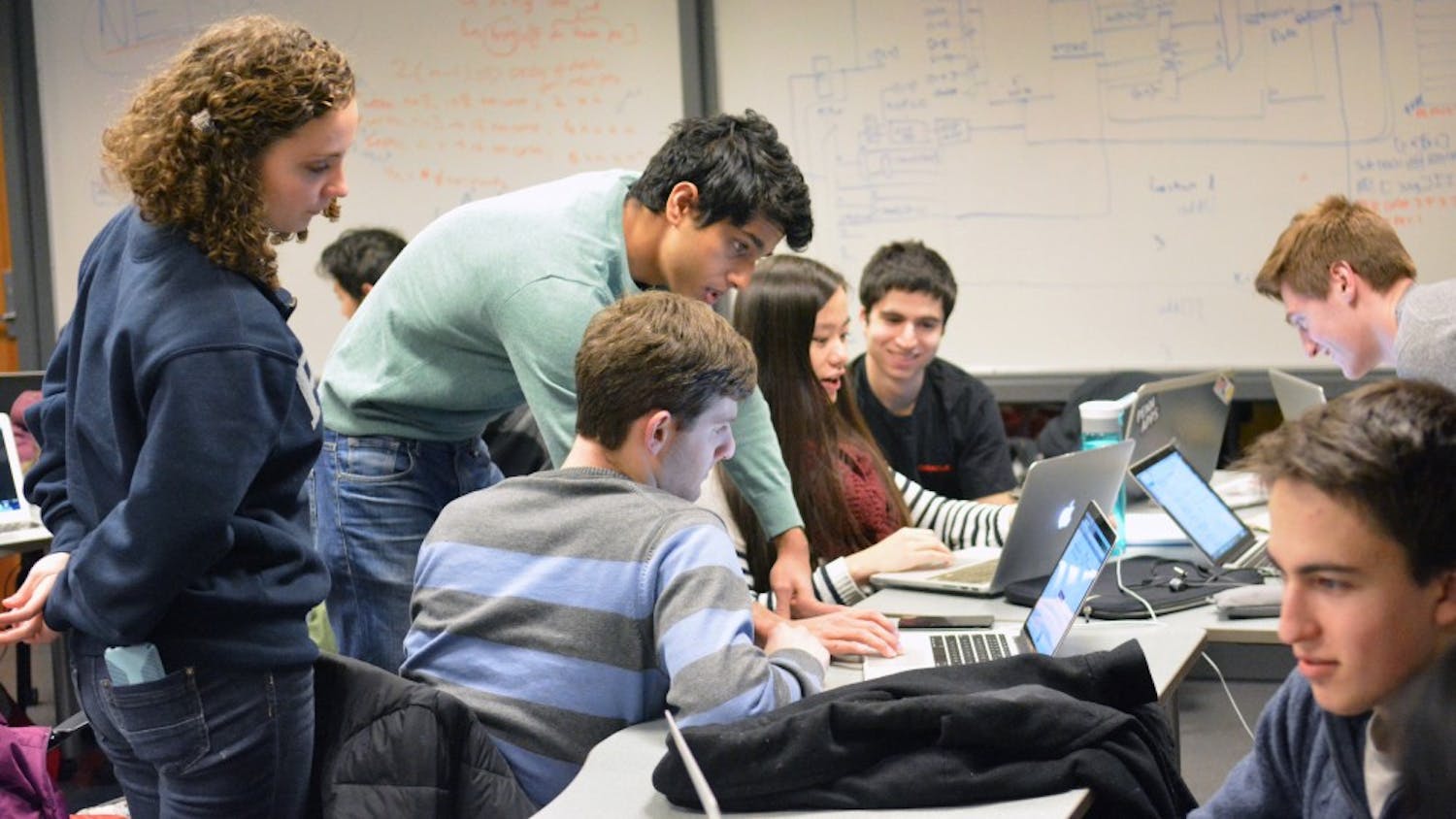 Members of Hack4Impact met during a weekly work session at the Weiss Tech House in the Levine Building.