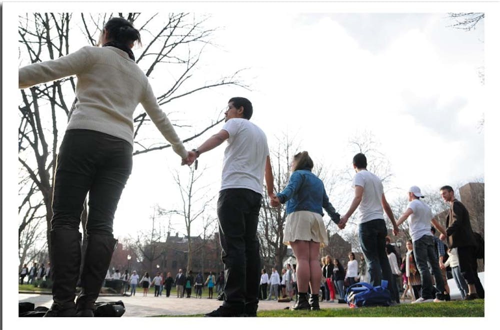  Students standing silently in support of Tania Chairez, an undocumented Wharton sophomore who was arrested