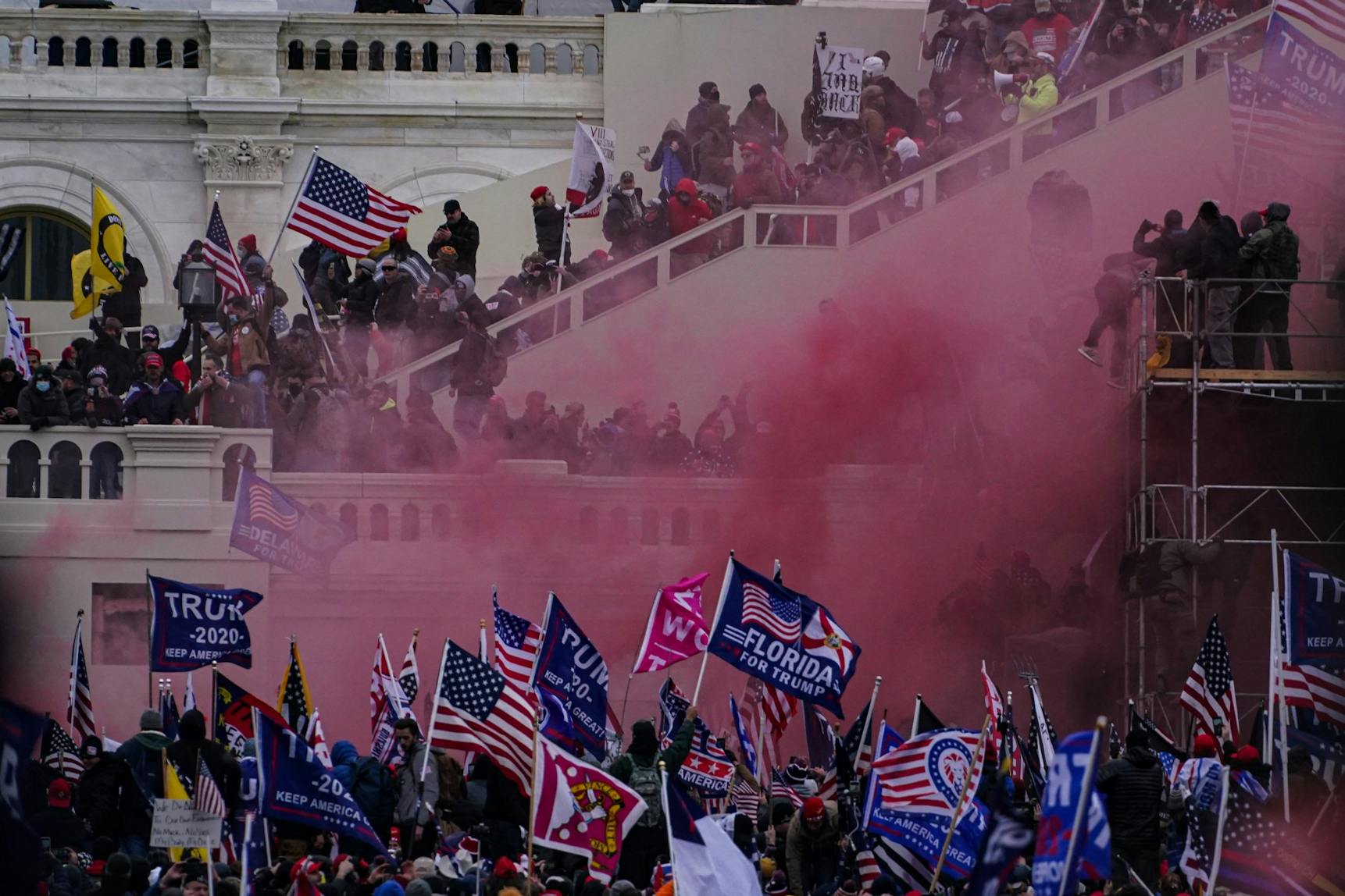 Trump Capitol Riot Washington DC January 6 2021 Red Smoke.jpg