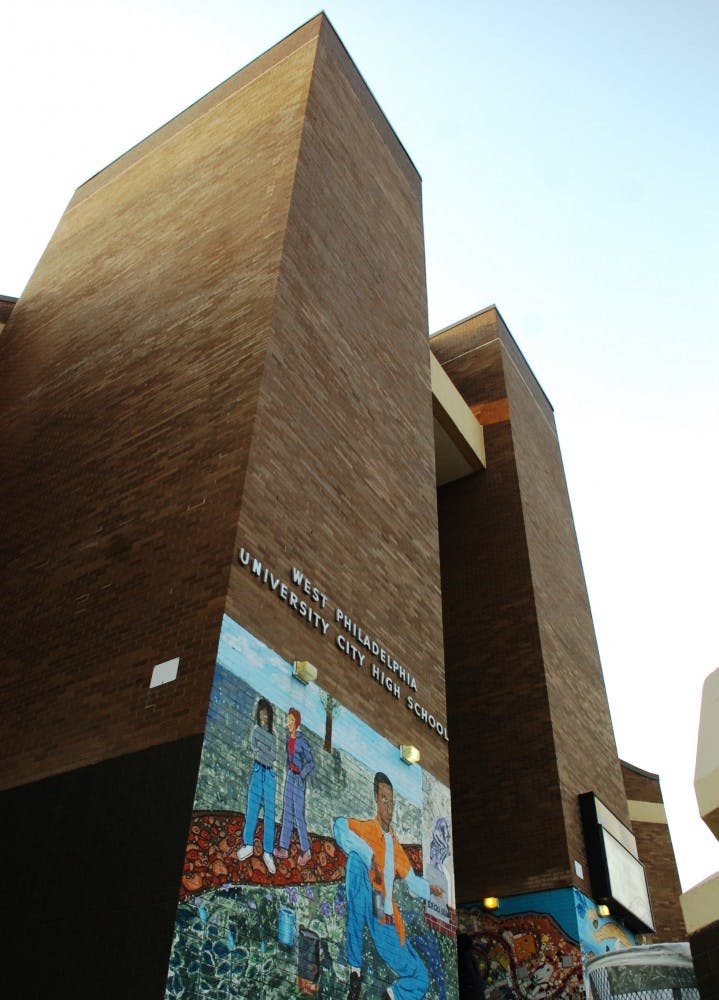 Murals outside University City High School, located at 36th and Filbert streets, illustrate the school's close relationship with the community.