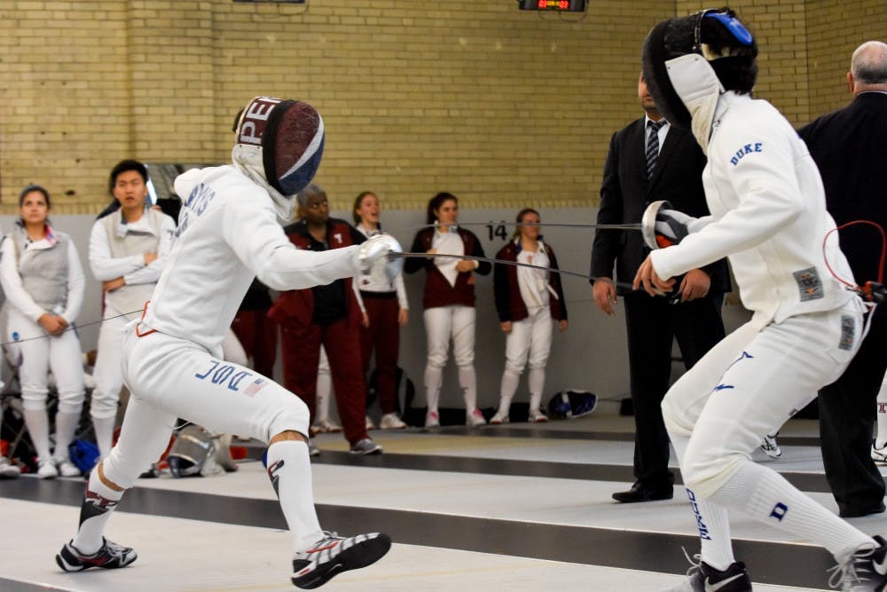 Sophomore Epee Justin Yoo and Junior Epee Jake Raynis are much more than college teammates — they are childhood friends.