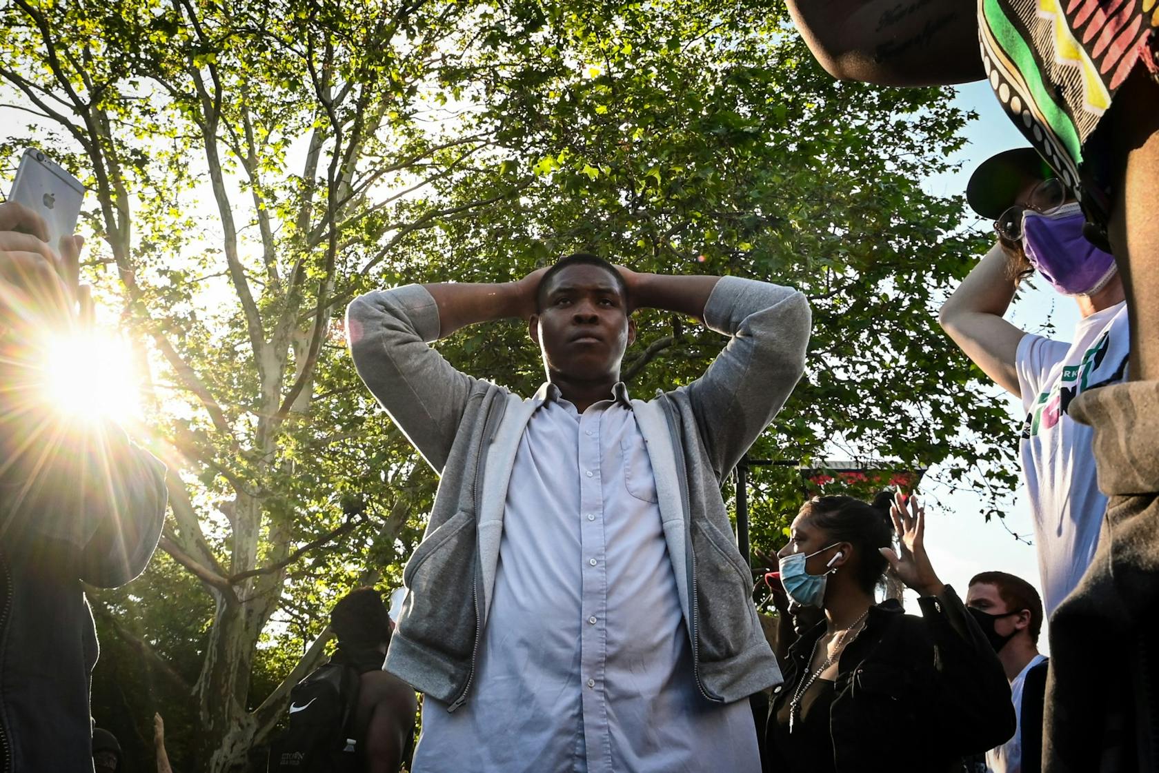 06-01-20 George Floyd Protest Hands Up Sun.jpg