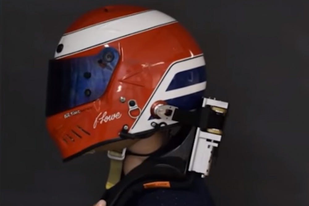Engineering seniors Bahram Banisadr and Anthony Terraciano and 2015 Engineering graduates Kris Li and Mark Gallagher designed MechaNek, a robotic head restraint to improve safety for racecar drivers. | Courtesy of Mark Gallagher's Youtube