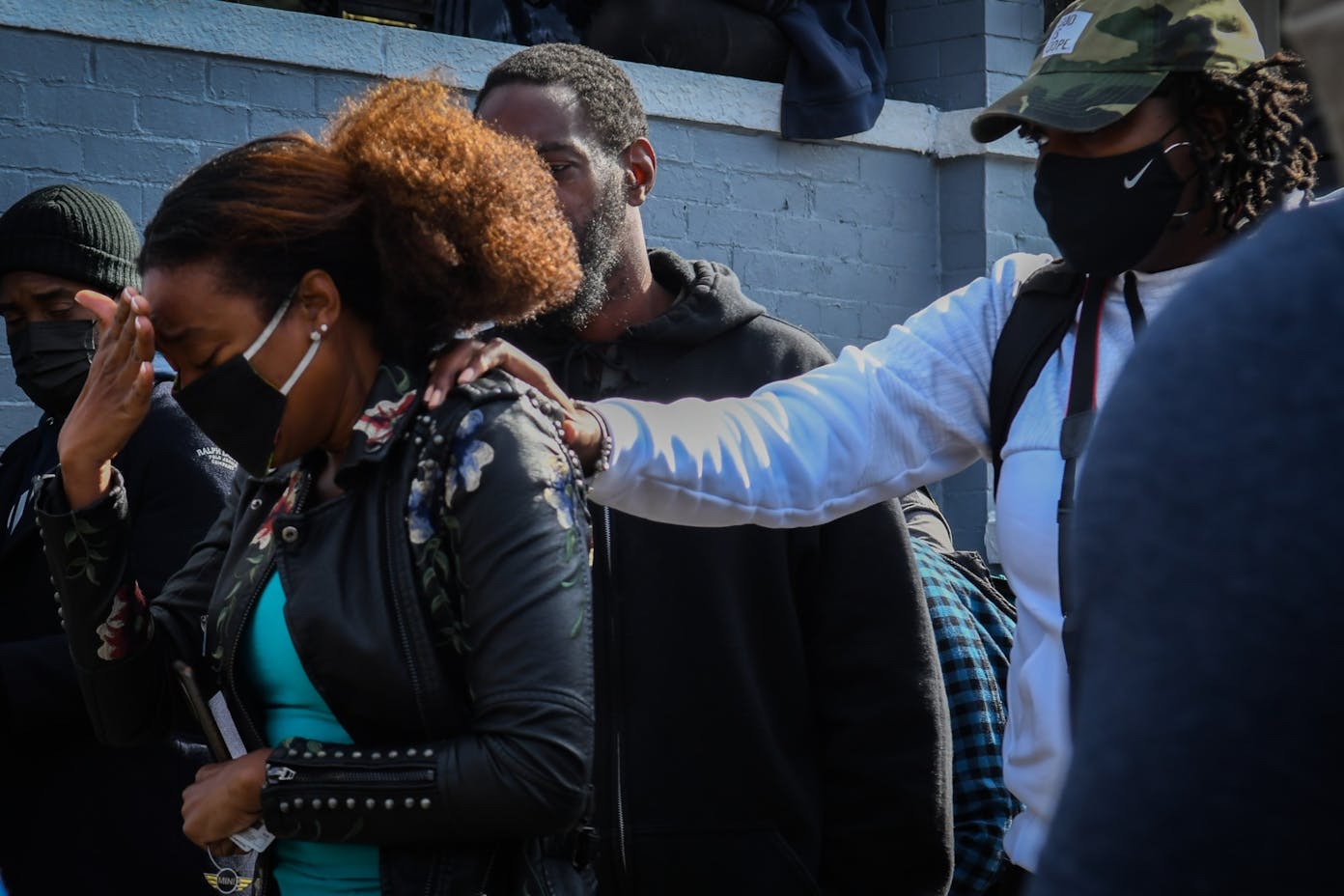 10-31-20 West Philadephia Walter Wallace Black Lives Matter Protest Philadelphia Protester Crying and Supporter Hand on Back.jpg