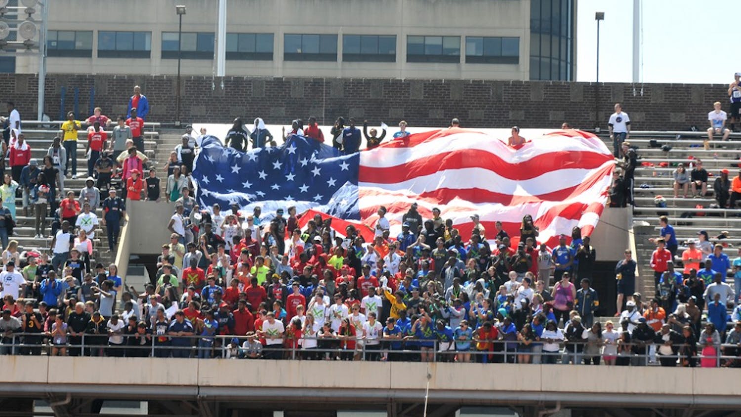 Penn Relays 2013, held at Franklin FIeld, featuring multiple Olympian athletes in the USA vs the World event