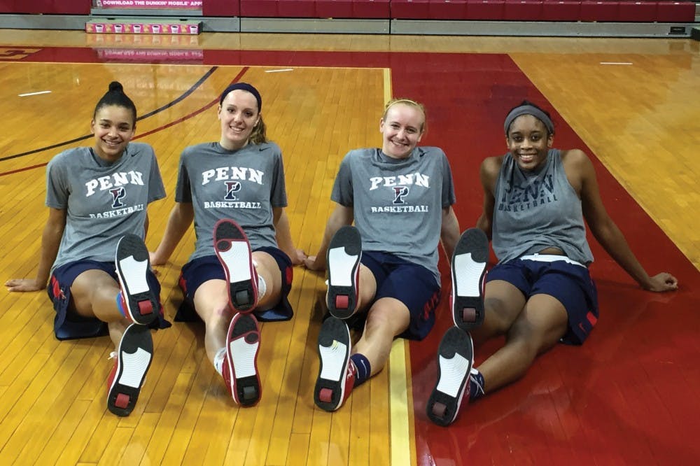 A crew of Penn women's basketball players, led by sophomores Anna Ross (far left)&nbsp;and Michelle Nwokedi (far right), have brought back an old childhood favorite: Heelies.