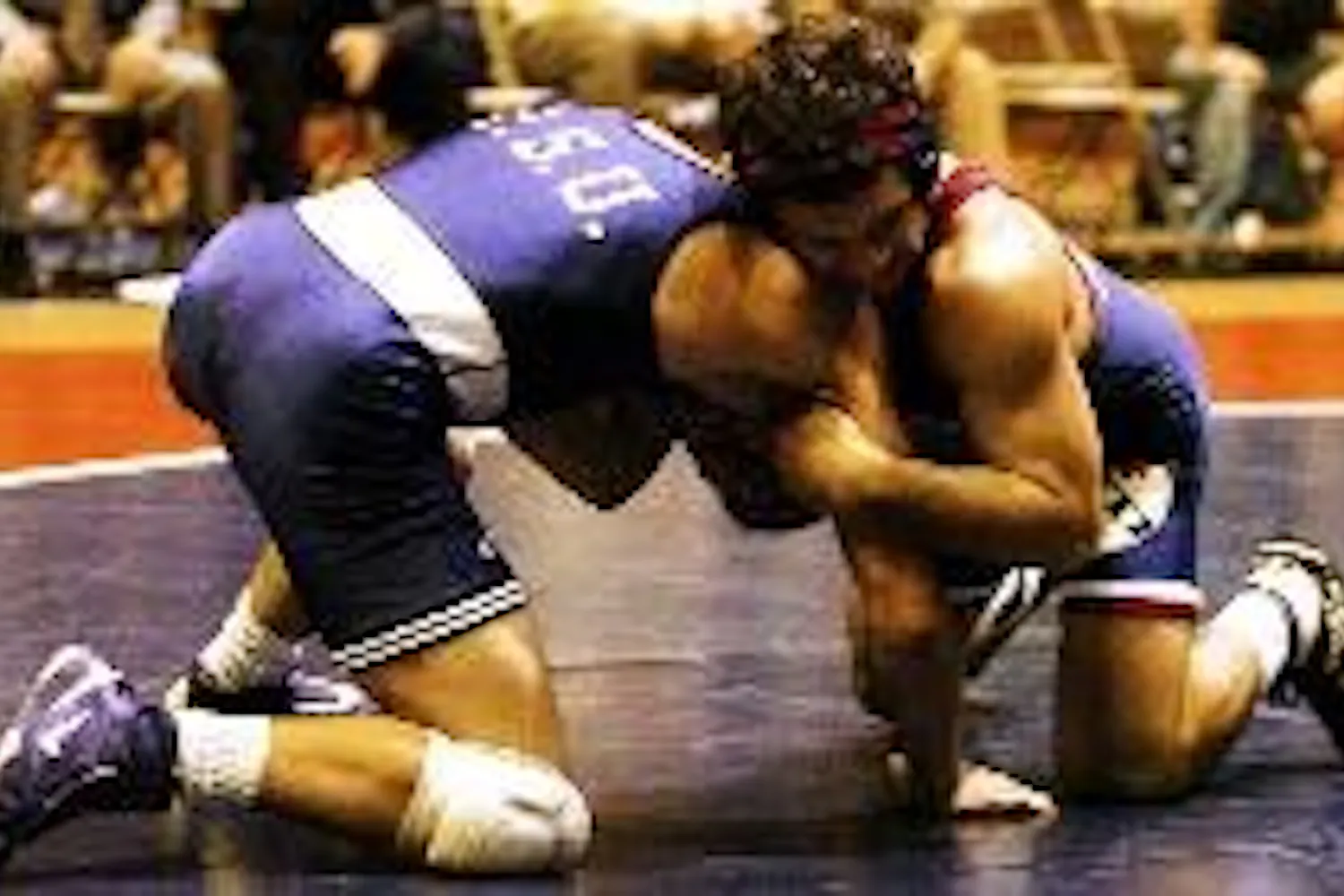 Wrestlers head back to the drawing board after losses to Nos. 12, 1