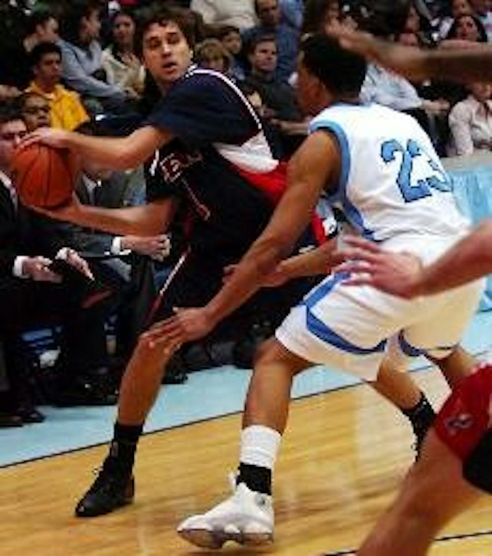 Syracuse 2-3 zone will test Quakers