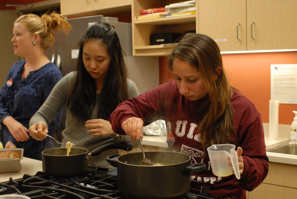 Sigma Kappa sisters cook for the residents of the transplant house