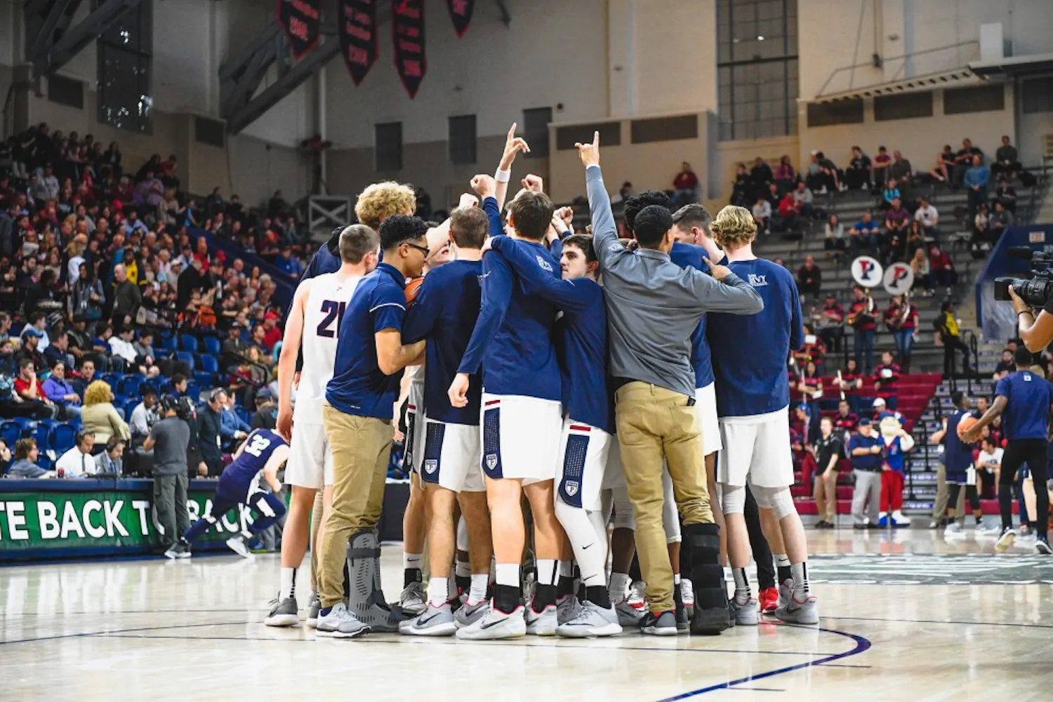 MBB_Mens_Basketball_vs_Yale_Ivy_Tournament_Huddle.jpg