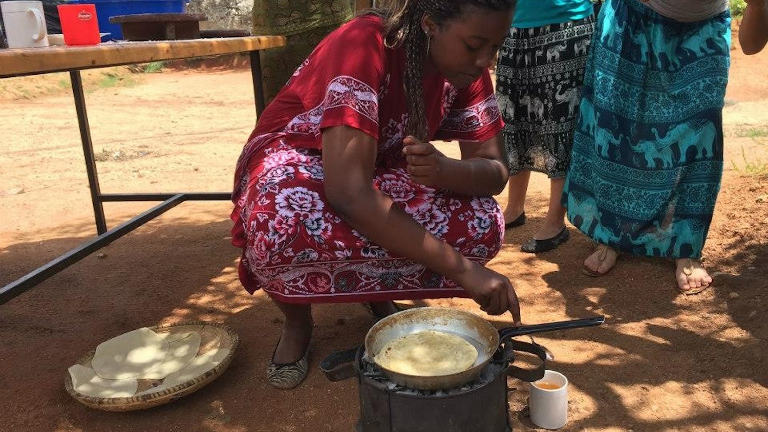 College junior Hannah Watene made chapatti, a local flatbread, in Iringa, Tanzania.