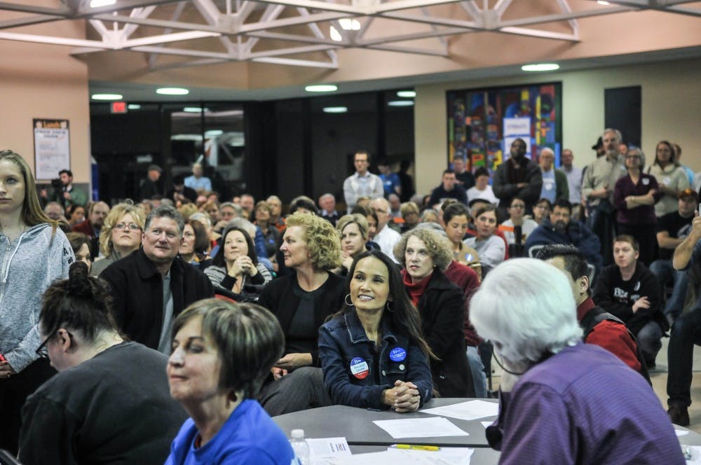 Over 300 people listened to the results of their caucusing in Clive, IA. 