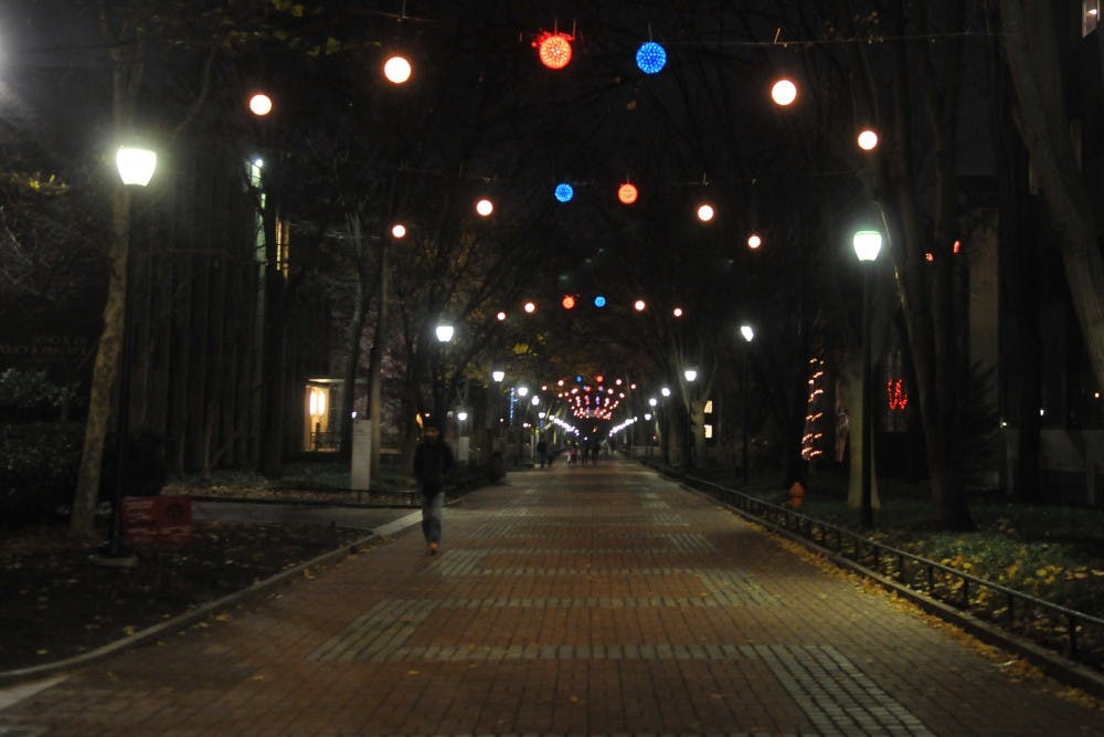 Lights over Locust Walk change for a Red and Blue center this year. 