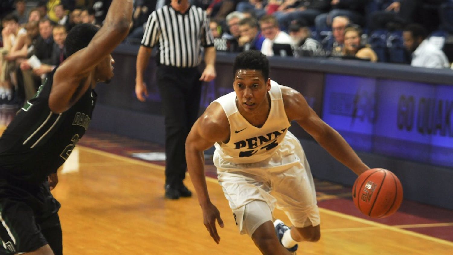Behind 15 points and 10 rebounds from senior forward Matt Howard, Penn basketball cruised past Robert Morris in its season opener on Friday.