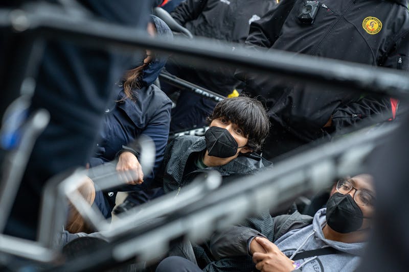 &#39;Low point at this university&#39;: Penn professors led away from 34th and Walnut streets during protest