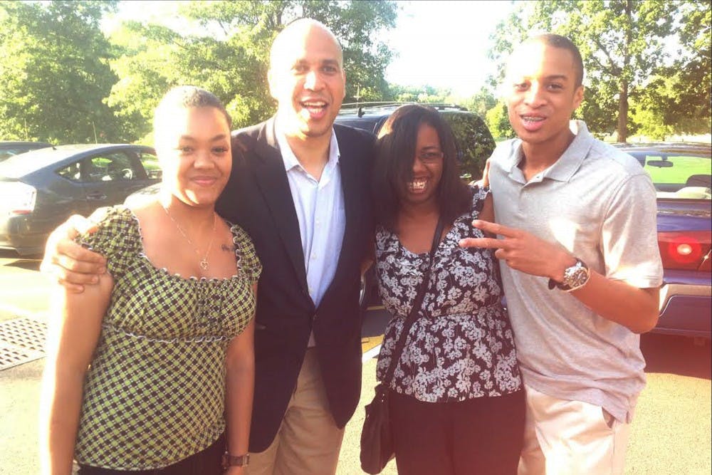 Timothy Hamlett with god sister Crystal Montgomery, NJ Senator Cory Booker and cousin Michelle Paynes