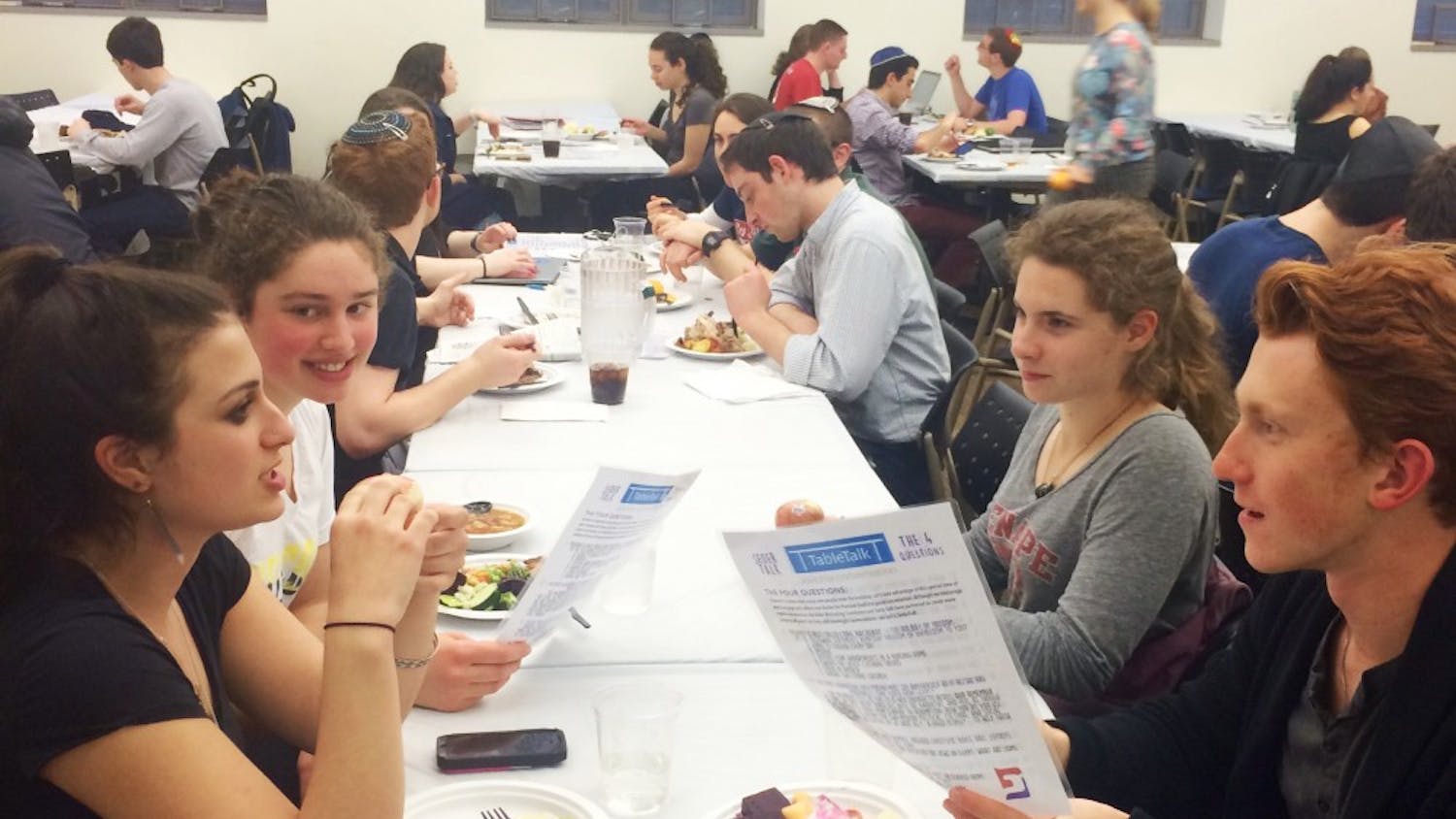 TableTalks partnered with Hillel at its Passover seder, setting placemats on tables with questions such as "What is your favorite passover tradition?"