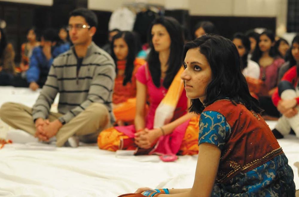 Students gathered to pray for the annual HSC Puja.