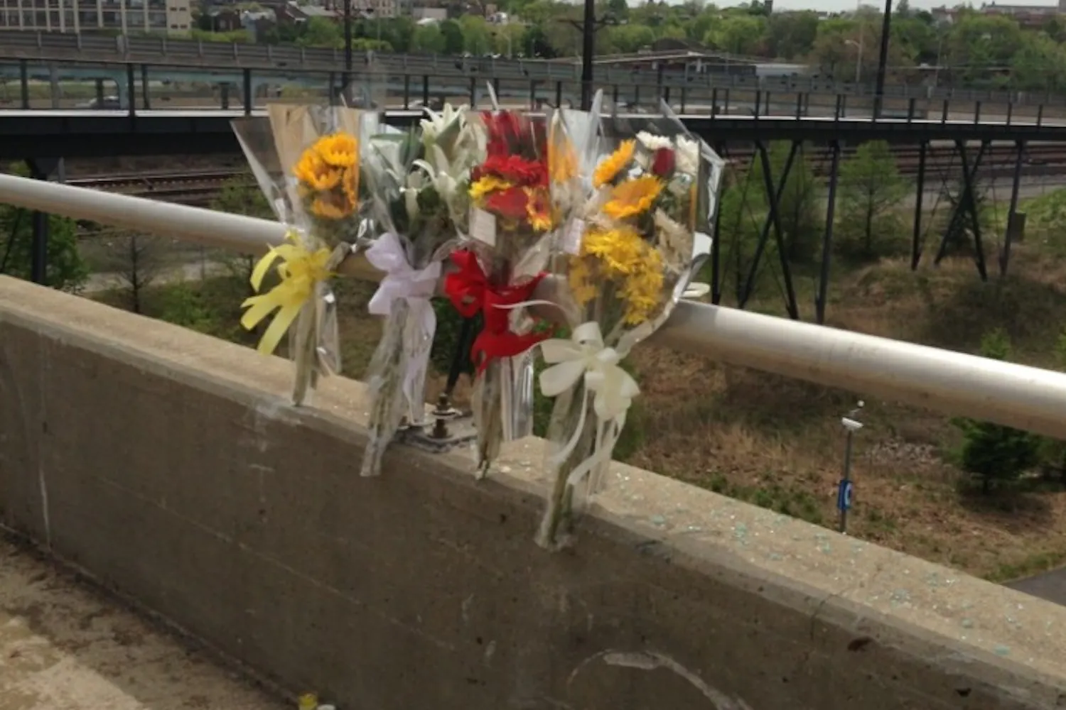 Flowers and candles were left at the 30th and Walnut street intersection in memory of Lauder Institute student Zachary Woods, who fell to his death Tuesday after an accident at the intersection.