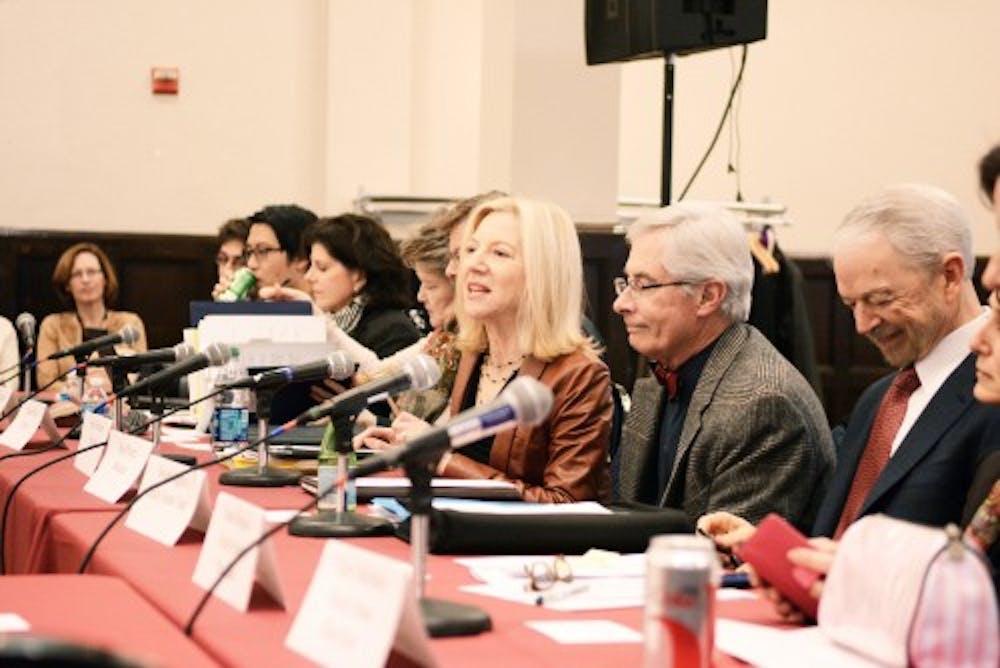 Penn President Amy Gutmann, center, spoke at a University Council meeting last year during which she introduced the Task Force on Student Psychological Health and Welfare.